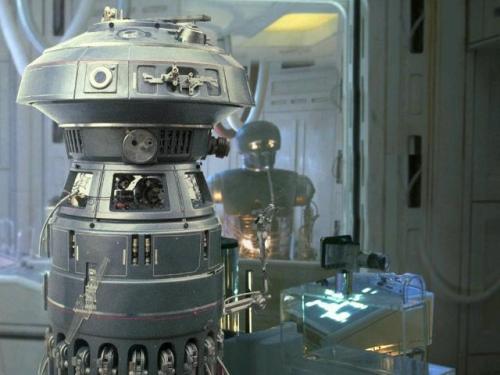 FX-7 is the droid in the foreground.