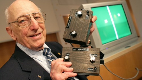 German-American game developer Ralph Baer shows the prototype of the first games console which was invented by him during a press conference on the Games Convention Online in Leipzig, Germany in 2009. Baer died on Saturday. He was 92.